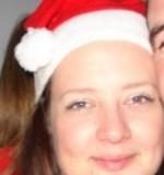 ¡FELIZ NAVIDAD! – Christmas in Barcelona Janine in a Santa Hat